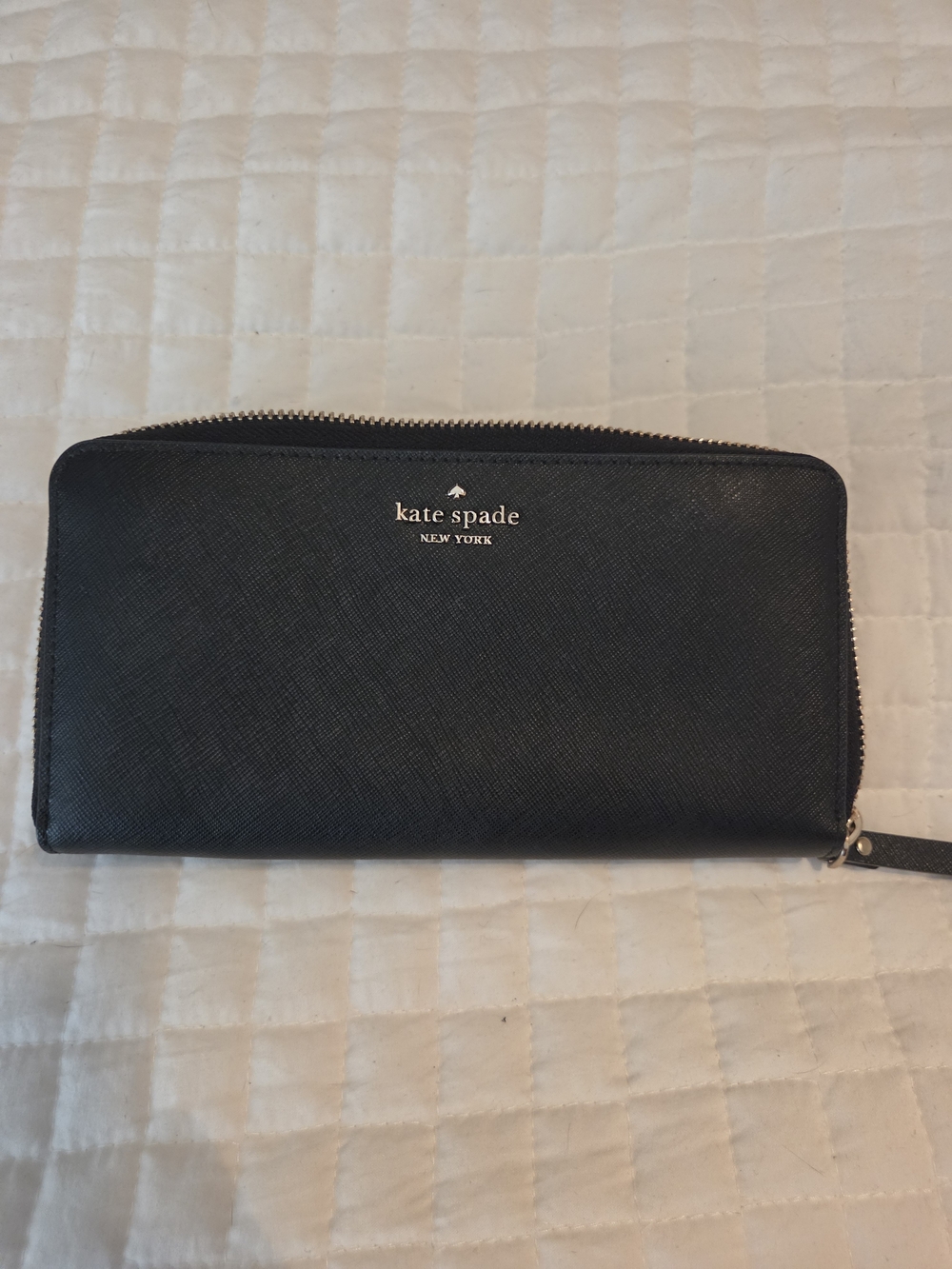 kate spade black zip-around saffiano wallet